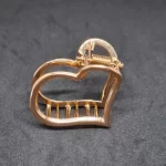 Presilha coração vazado dourada metal acessório para cabelo